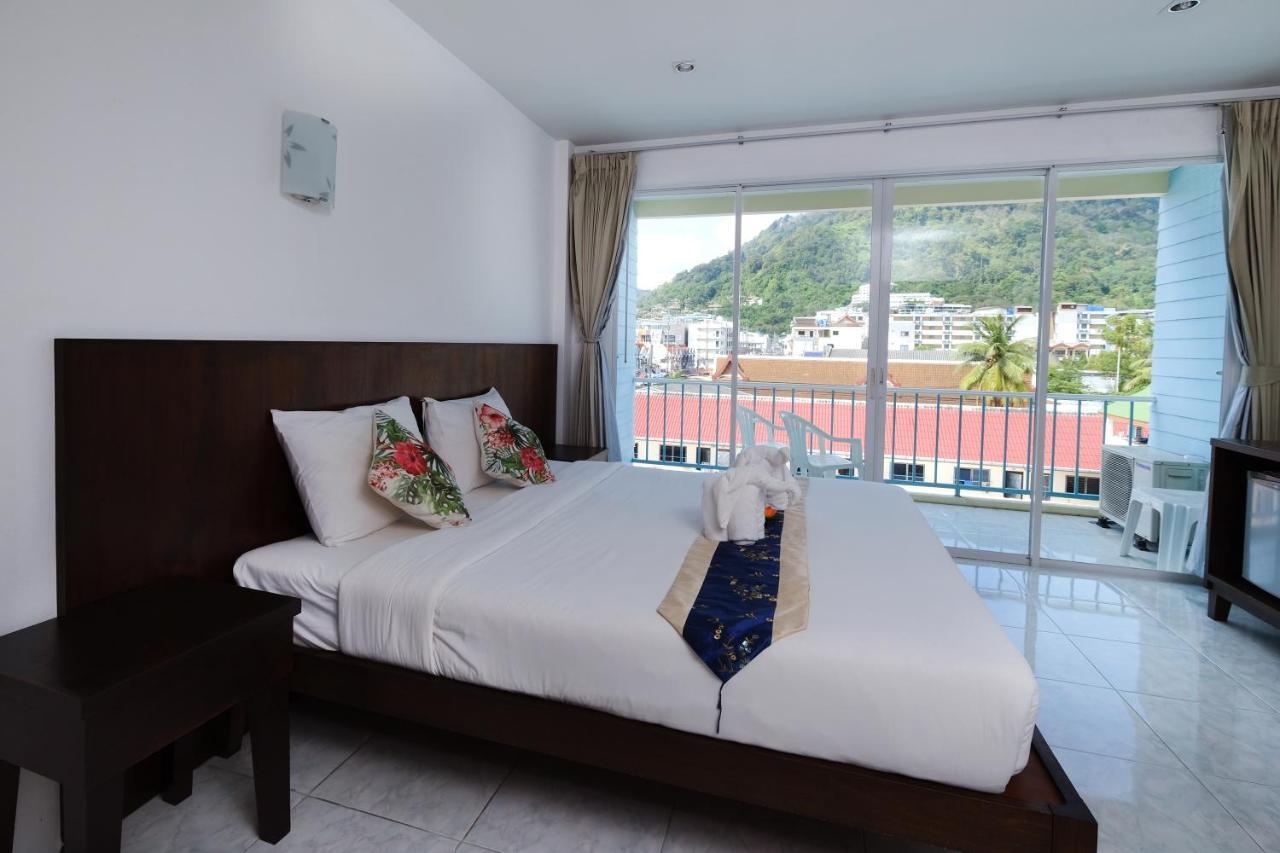 Kiwi Boutique Hotel Patong Bagian luar foto