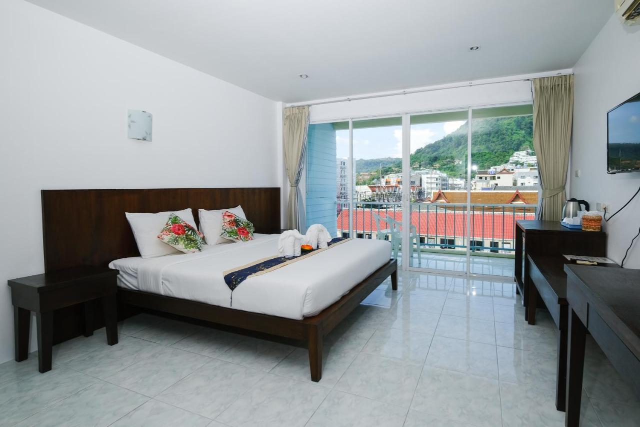 Kiwi Boutique Hotel Patong Bagian luar foto